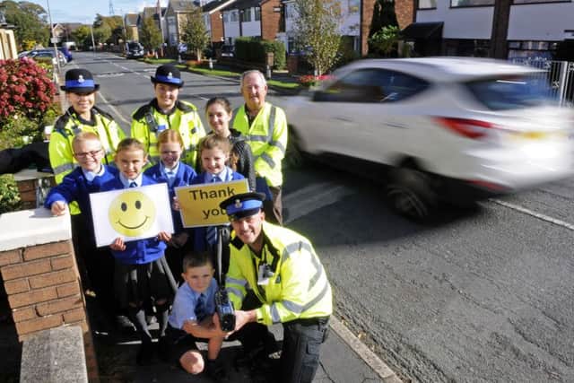 Pupils from Staining Primary School help take part in a speed awareness campaign with PCSOs on Chain Lane