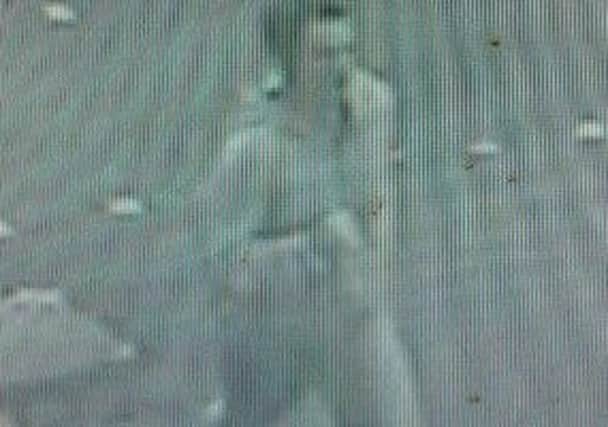 CCTV of a man police would like to speak to after a phone was stolen from a woman's hand in Abingdon Street