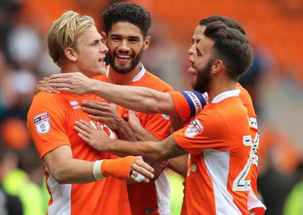 Blackpool's Brad Potts celebrates scoring his side's fourth goal
