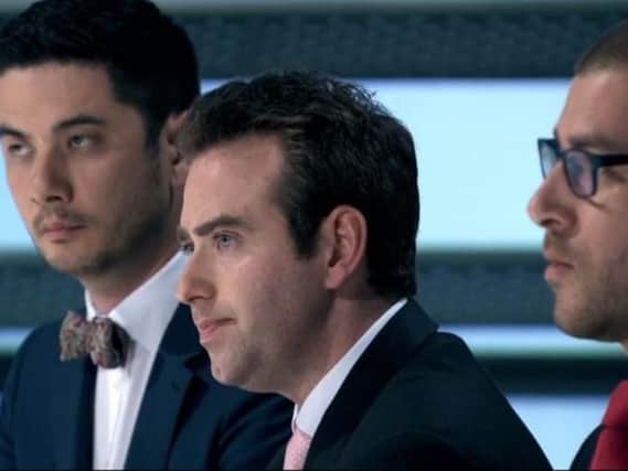 In the firing line: Mukai, Oliver and Paul face Lord Sugar in the Boardroom