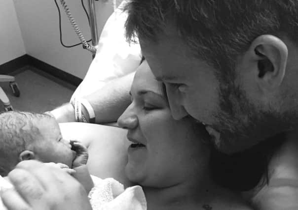 Guardian Angel: Will and Nichole with baby Annabella just minutes after she was born