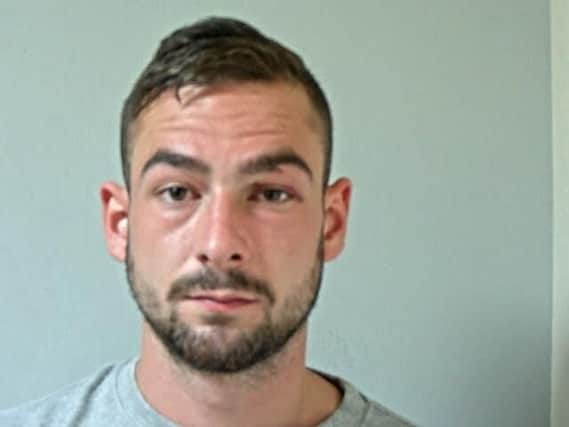 Dale Docherty is wanted in connection with an alleged assault