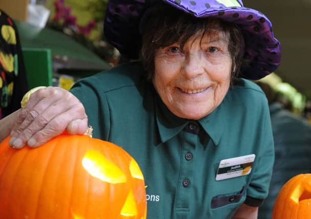 Staff from Morrisons give pumpkin carving demonstartions.  Pictured is Judith Chappell.