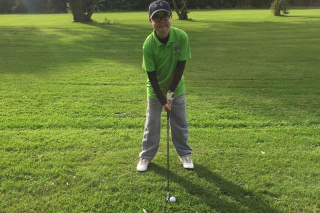 11-year-old Ollie Alderson back on the golf course at Poulton for the first time after a heart transplant