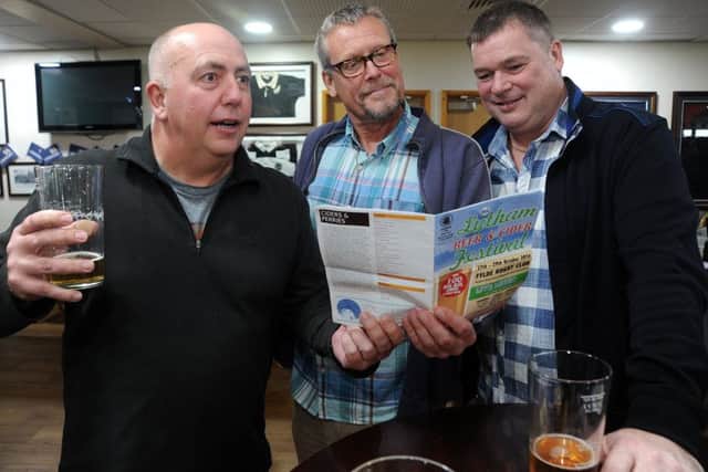 Fylde Rugby Club was the new venue for this year's Lytham Beer and Cider Festival.
Browsing the beer list are L-R: Steve Beaumont, Gary Cordingley and Graham Thompson.  PIC BY ROB LOCK
28-10-2016