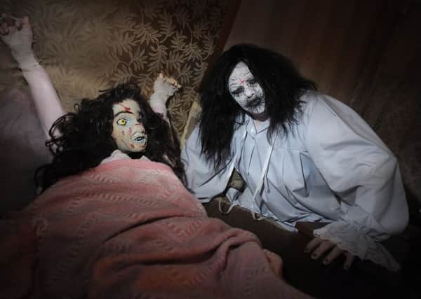 The Wilkinson family, of Derbe Road in St Annes, have transformed their home into a Halloween house of horrors to raise funds for an HIV charity.
Penny Wilkinson joins Regan in the Exorcist-themed room.  PIC BY ROB LOCK
28-10-2016