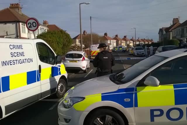 Forensics experts were seen in Westmorland Avenue after the attack