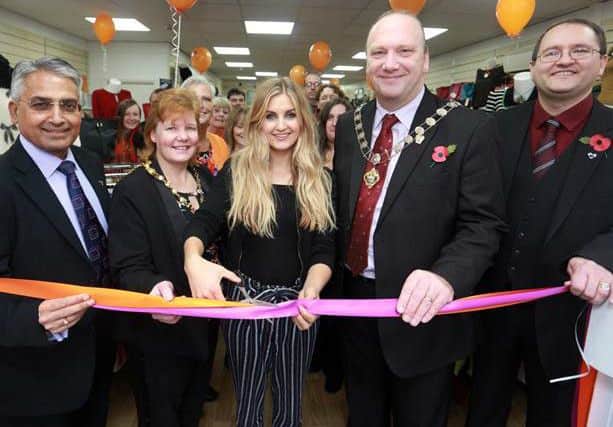 Sophie Powles cuts the ribbon on the new Sense store in Abingdon Street