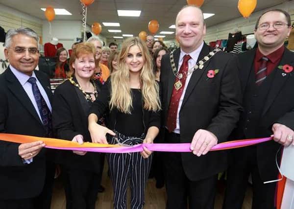 Sophie Powles cuts the ribbon on the new Sense store in Abingdon Street