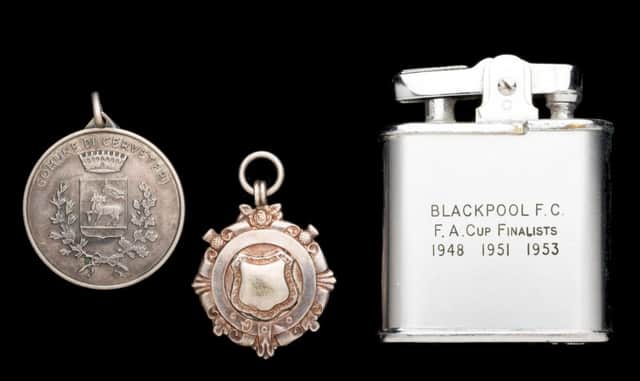 Stan Mortensen medals and engraved lighter up for auction