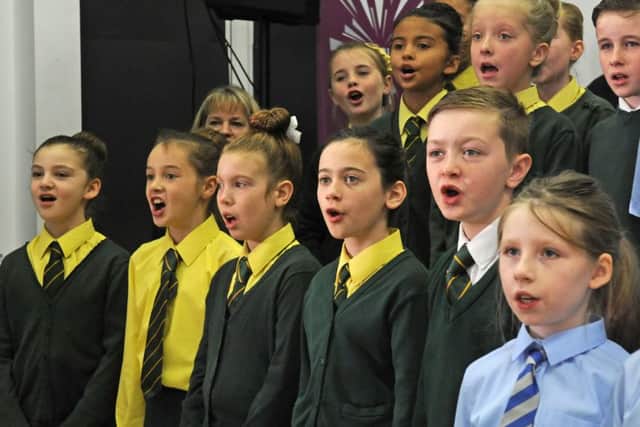 Students from Blackpool Sixth Form College and school pupils from across Fylde take part in the recording of a single to raise money for the Children's Society