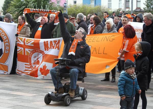 Blackpool fans protest against the club owners outside the ground