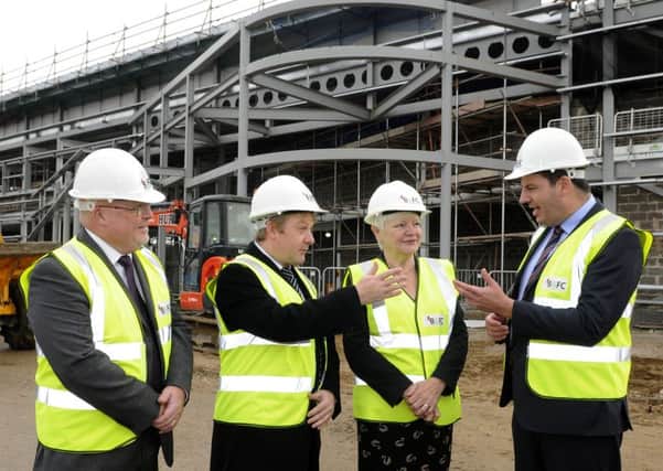 Minister Andrew Percy visits the Enterprise Zone at Blackpool Airport.  He is pictured with Daryl Platt from B&FC, Simon Blackburn and Jennifer Mein.