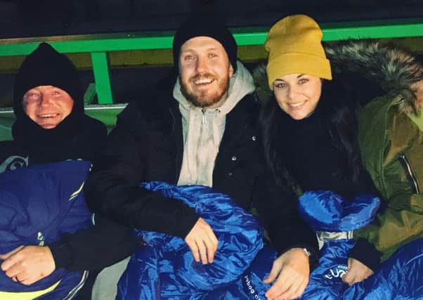 Lytham boxer Scott Cardle, his girlfriend Carlie Firth and father Joe taking part in the  Glasgow Sleep Out at Celtic Park