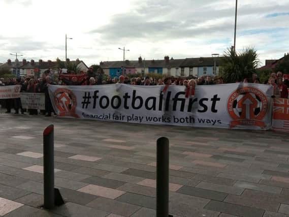 Blackpool fans protesting outside Bloomfield Road.