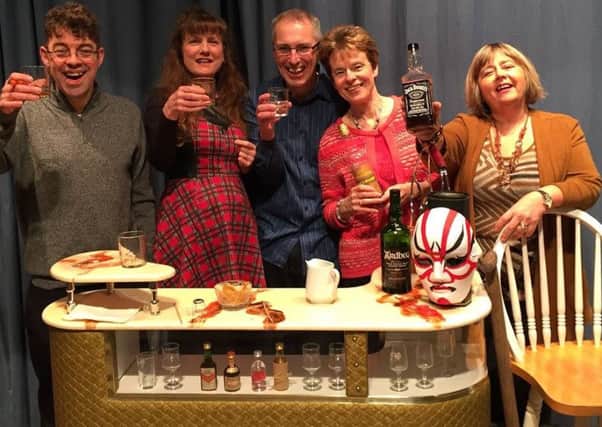 The Lancastrian Players toast their latest production from behind their fabulous retro bar  - from left Richard Hunt, Helen Bashford, Steve Quinn, Carolyn Quinn and Amy Friese-Green.