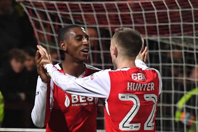 Amari'i Bell celebrates with fellow scorer Ash Hunter