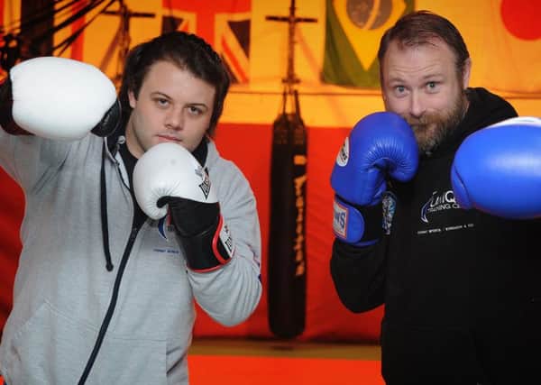 Owner of the Unique Training Centre Scot Tudhope is organising a 'white collar' boxing show to buy a specially-adapted tricycle for an autistic Blackpool girl.
Scot (right) with business partner Matthew Wild.  PIC BY ROB LOCK
15-11-2016