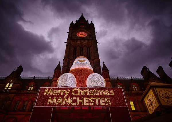 Manchester German Christmas Markets on Albert Square in front of the landmark Town Hall
Markets