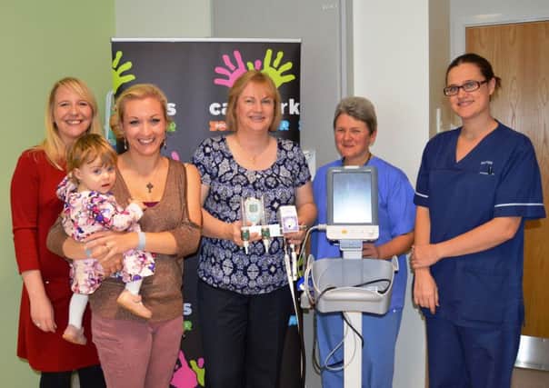 Charity Manager for Cash for Kids, Nikki Thompson; Sarah Schofield with Sophie, Neonatal Ward Manager, Catherine Nash; Staff Nurse Anita Payne and Sister Katie Lander with the new equipment