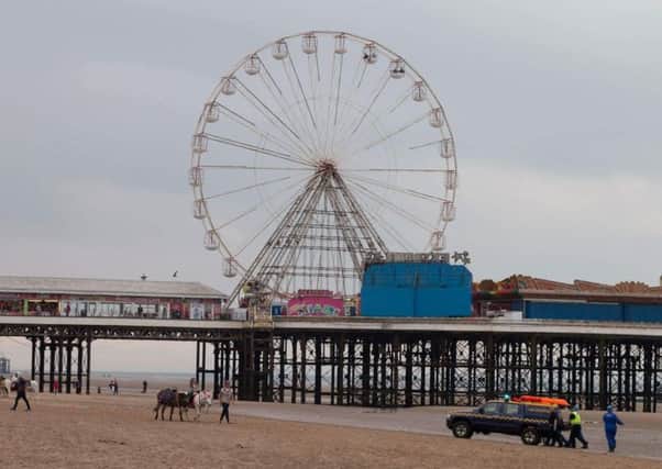 The body of Christopher Lynch, 41, from Leicester washed on on the beach as tourists walked nearby (Pic: Gavin Stanfield)