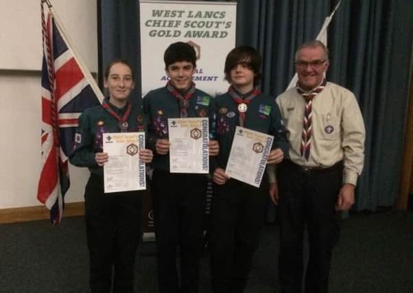 Amy Jane Cartwright, Nathan Addleston and Owen Wilson with Stewart Swan, assistant district commissioner responsible for the Scout Section in Blackpool