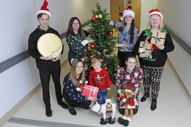 Launch of Christmas Gifts Appeal at Blackpool Victoria Hospital. Pictured L-R are Liam Croft, Rebecca Ferguson, Louise Turvey with Austin Anderson, Hannah Corleff, Tiffany Bradford and Ann Healey.