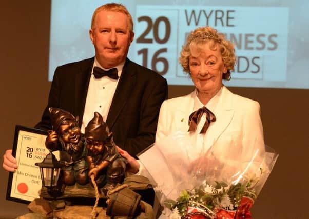 Mrs Doreen Lofthouse OBE receiveing her Lifetime Achievement Award fro Leader of the Council Peter Gibson at the Wyre Business Awards 2016