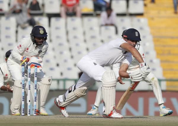 England's captain Alastair Cook is bowled out by India's Ravichandran Ashwin