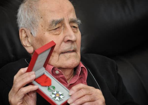 Picture by Julian Brown 06/12/16


Ernie Lee, 92, who has been awarded a military medal, the Legion D'Honneur medal by the French government pictured at his Fleetwood home.