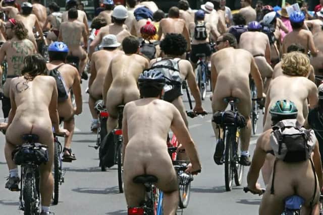 Cyclists enjoying World Naked Bike Ride Day (Photo:PHILIPPE DESMAZES/AFP/Getty Images)