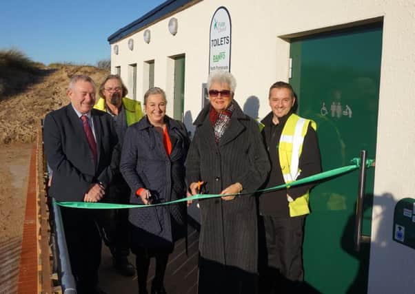 Fylde Council leader Sue Fazackerley, and director of resources Tracy Morrison (holding scissors) at the official openingh of the new North Promenade toilet block with (from left) Gareth Matthews, waste prevention and enforcement officer at Fylde Council, Danfo general manager Andrew McIlduff and site manager Ray Humphries.