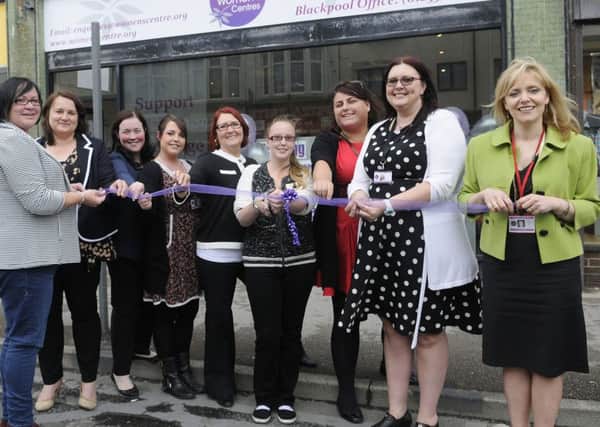 Lancashire Women's Centre opens in Church Street, Blackpool.  Staff members cut the ribbon.
