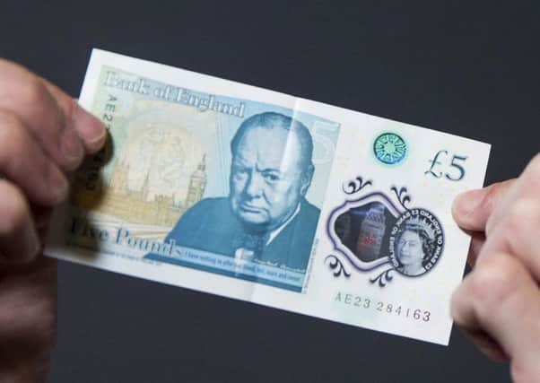 People are being urged to check their new fivers