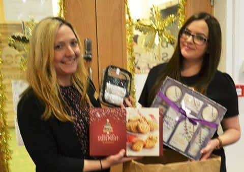 Staff at M&S show off their haul
