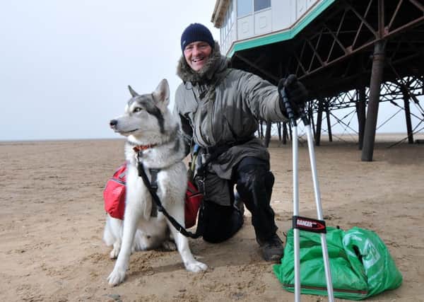 Wayne Dixon and his dog Koda at St Annes beach on their epic litter picking journey walking the coast of Britain