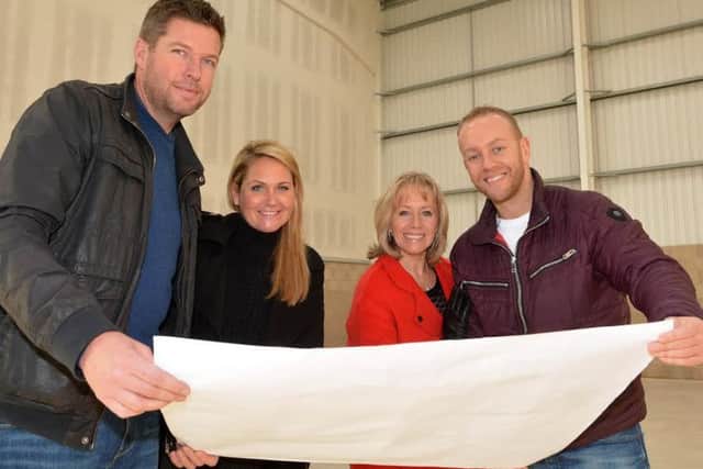 L-R Ben Wade, Anne Wade, Karen Barber & Daniel Whiston look over the plans for Clip n Climb Blackpool inside the unit where it will be located at Apollo Court on Whitehills Business Park,
