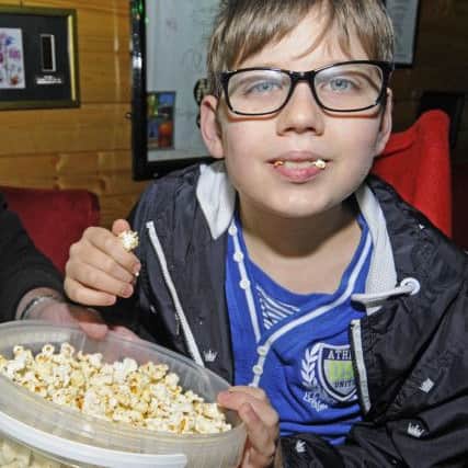 10-year-old Charlie Jordan has a private film screening with friends at Donna's Dream House