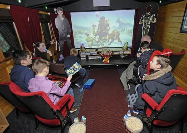 10-year-old Charlie Jordan has a private film screening with friends at Donna's Dream House