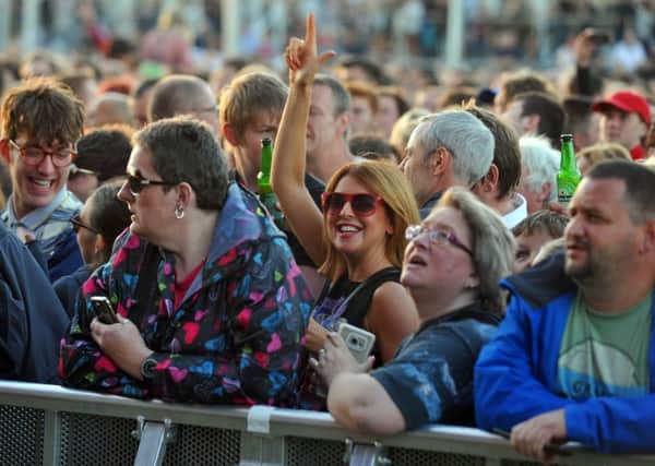 A section fo the crowd watrching Noel Gallagher's High Flying Birds on stage at Lytham Festival 2016