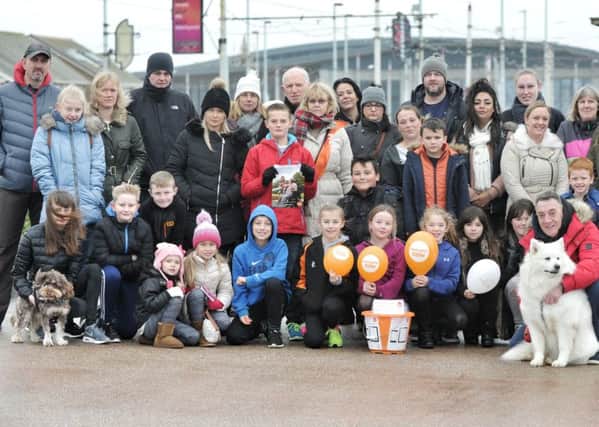 Picture by Julian Brown 11/12/16

Some of the walkers pictured before setting off

Fundraisers march in memory of Edward Dee from Starr Gate tram station, Blackpool