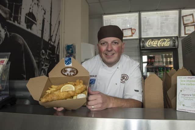 Christopher Richardson with the nations favourite - cod and chips