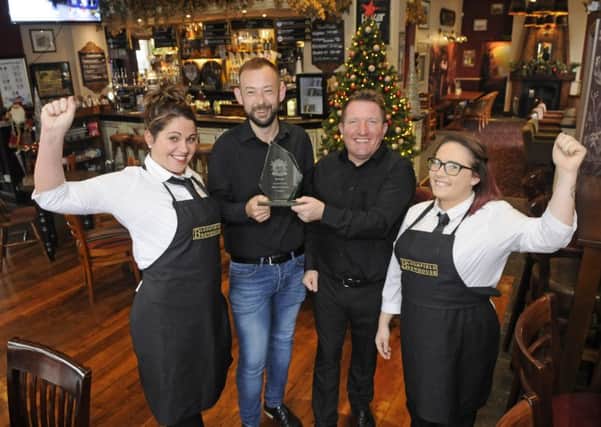 Bloomfield Brewhouse has won pub of the year.  Pictured are landlords Gary Towers and Shane Langford with staff Natalie Shorrocks and Sophie Moore.