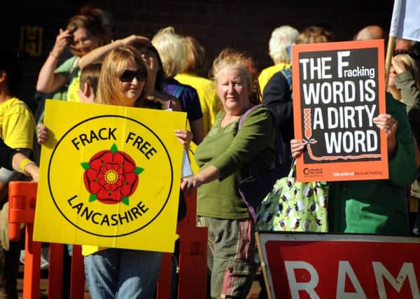 Anti-fracking protestors demonstrating outside County Hall in Preston