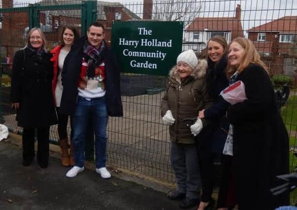 Members of Harry Holland's family at the official dedication of a garden at Claremont Community Centre to his memory