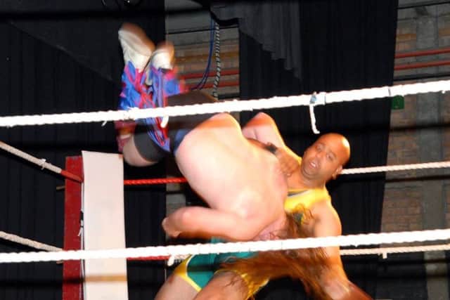 Shak Khan in action in the wrestling ring