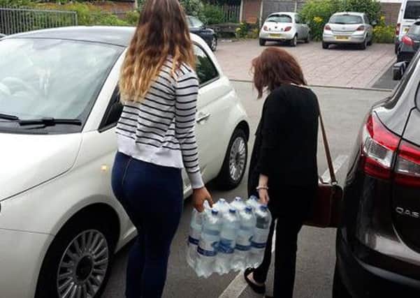 Charity workers distributed bottled water during the cryptosporidium crisis