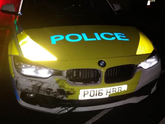 Police are appealing to trace the driver of a silver Ford Focus that rammed into a police car. Photo: @LancsRoadPolice