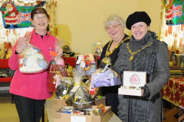 Volunteers from Care and Share, packing hampers through Sure Start.   Linda McEvilly with Mayor and Mayoress of Blackpool Sylvia Taylor and Julia Massey.