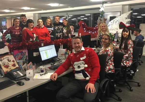 Employees at BES Utilities getting into the Christmas spirit to raise money for Brian House